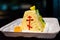 Close-up. Decorated Easter cake with an Orthodox cross depicted on the side