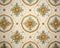 close up of a decorative design on a wallpapered surface with a circular design in the center.