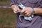 Close-up of decorative pigeon in the hands