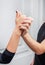 Close up of delicate tender hands of dancers. Ballroom dancers on the dance floor