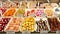 Close up of a delicatessen display case with a variety of foods with cheese at naschtmarkt in vienna