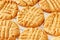 Close up delicious homemade peanut butter cookies on cooling rack. White background. Healthy snack concept. Macro photo