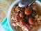 Close up of delicious Indonesian soto food. Stall food