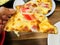 Close up of delicious Pizza with Crab sticks pineapple and ham bacon for italian foods backgrounds