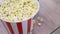 Close up of delicious popcorn in a bucket, concept of cinema