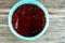 A close up of a delicious sweet red jelly pudding strawberry flavored, selective focus of chilled red strawberry jelly dessert,