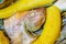 Close up of delicious typical amazonian food, fish cooked in a leaf with plantain