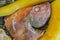 Close up of delicious typical amazonian food, fish cooked in a leaf with plantain