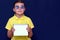 Close up Delivery kid boy in casual clothes Showing clipboard Holding Box Watching in Camera