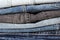 Close up of denim clothes or jeans pile