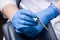 Close-up. Dentist holding reverse tweezers. Orthodontic treatment