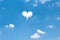 Close up  design of clouds heart shape on vast bright bluesky love summer background