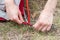 Close up detail of camping tent. Aluminum tent poles. Process of installing tent, setting up tent outdoors