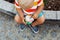 Close-up detail of child eating ice cream.