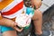 Close-up detail of child eating ice cream.