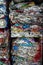 Close up detail crushed compressed aluminum drink cans at recycling center