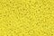 Close-up detail Illuminating yellow color plastic doormat texture. Neutral abstract backdrop surface. Color of the year 2021
