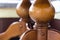 Close-up detail image of wooden table. Element of oak furnishing. Decorative wooden part of a kitchen classic table.