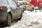 Close-up detail rear part of car parked in deep snow in parking