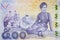 Close-up detail of Thai baht banknote.  baht is the national currency of Thailand