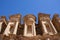 Close-up and detail of the upper part of the Monastery in Petra, also called El Deir