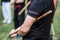 Close-up detail view of filipino escrima instructor holding bamboo stick