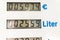 Close-up detail view of fuel pump digital display showing high rising super and diesel gasoline petrol price at gas