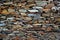 Close-up detail view of an old traditional stone wall built from schist in PiodÃ£o, made of shale rocks stack, one of Portugal\'s