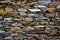 Close-up detail view of an old traditional stone wall built from schist in PiodÃ£o, made of shale rocks stack, one of Portugal\'s