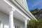 close-up details of deep eaves on a white italianate house