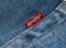 Close up of the details of new LEVI\'S 501 Jeans. Seams and denim texture close-up. Classic jeans model. LEVI\'S