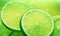 Close-up of dewy lime slices background. Created by AI