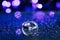 Close up diamond ring wedding ring inside circle. Creative wedding invitation card concept. Sparkling purple background