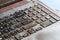 Close-up on dirty and unhygienic computer laptop keyboard, full of dust and particles