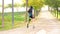 Close-up of a disabled man with prosthetic leg running outdoors