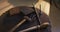 Close up of diverse jeweler tools lying on desk in workshop