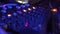 Close up DJ mixer player and sound console for music party. DJ control music console and colorful light in nightclub