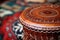 close-up on a djembe, an african drum with intricate designs