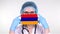 Close-up. Doctor in glasses, blue medical cap, gloves holds in hands medical mask with Armenia flag. Physicians care