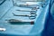 Close up of doctor hands during surgery in operation room. Sterile surgery instruments used in a real operation. Focus