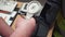 Close-up of a doctor who measures the pressure of the patient. Clip. Male doctor checking blood pressure to young man