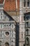 Close-up of the dome of the Santa Maria del Fiore Cathedral and Giotto`s Campanile in Florence.