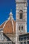 Close-up of the dome of the Santa Maria del Fiore Cathedral and Giotto`s Campanile in Florence.