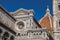 Close-up of the dome of the Santa Maria del Fiore Cathedral and Giotto`s Campanile in Florence.