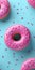 Close-up of donuts with multi colored sparks, pastel colors. Sprinkled sweet and colorful glazed doughnut. Flat lay food