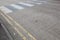 Close-Up of double yellow line on road and Zebra crossing