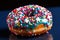 Close up of a doughnut sprinkled with frosting and red blue candy bits. Generative AI