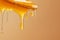 Close-up of dripping golden honey