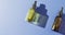 Close up of dropper serum bottles on blue background with copy space