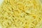 Close up of dry Chinese yellow egg noodles background and texture